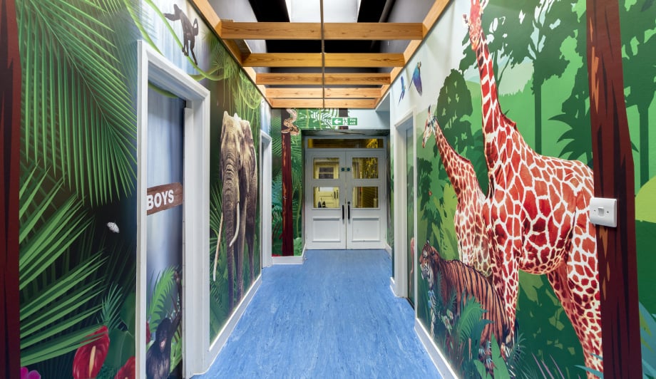 Mottingham Primary School immersive wrap around themed corridor wall art