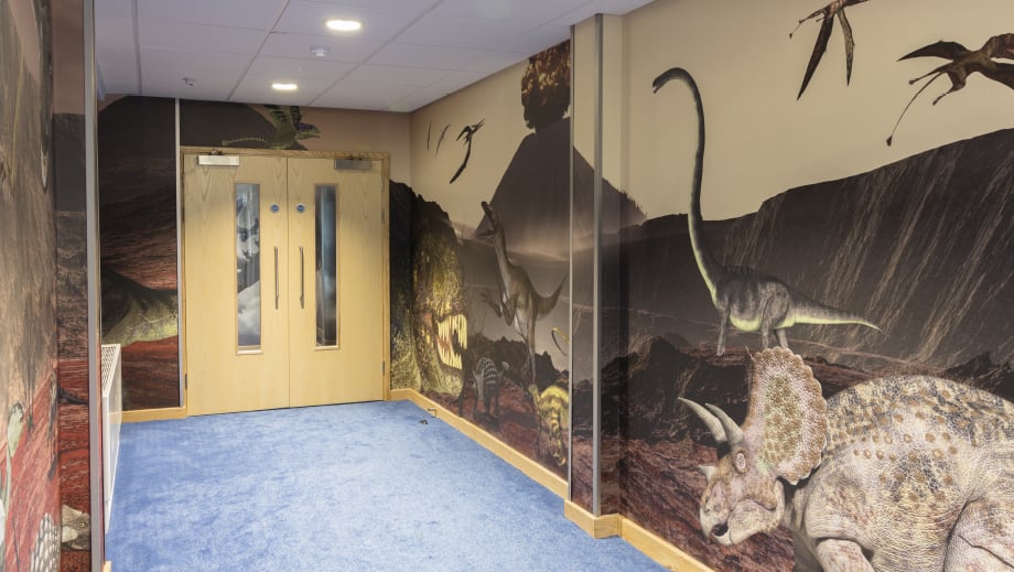 Lee Chapel School large format dinosaur corridor wrap around wall art