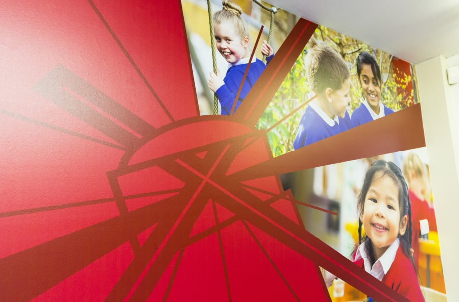 Holy Trinity school custom branding for welcome area wall art