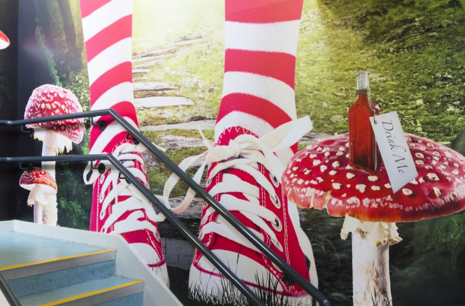 Alice in Wonderland themed school stairway makeover wall art