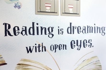 Ravenswood inspiring reading with library zone wall art