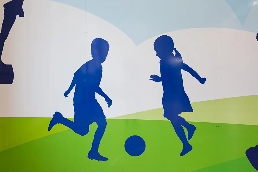 St Edwards bespoke design sports themed sports hall wall art