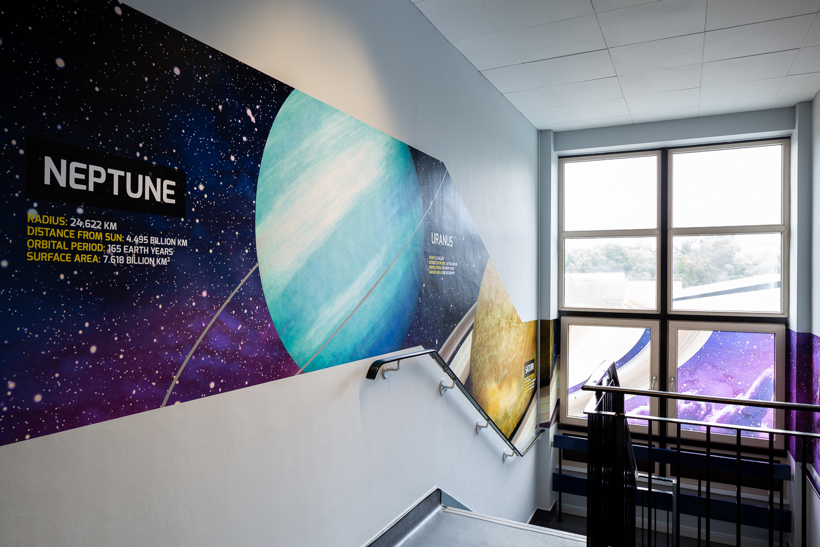image from completed school stairway wall art installation