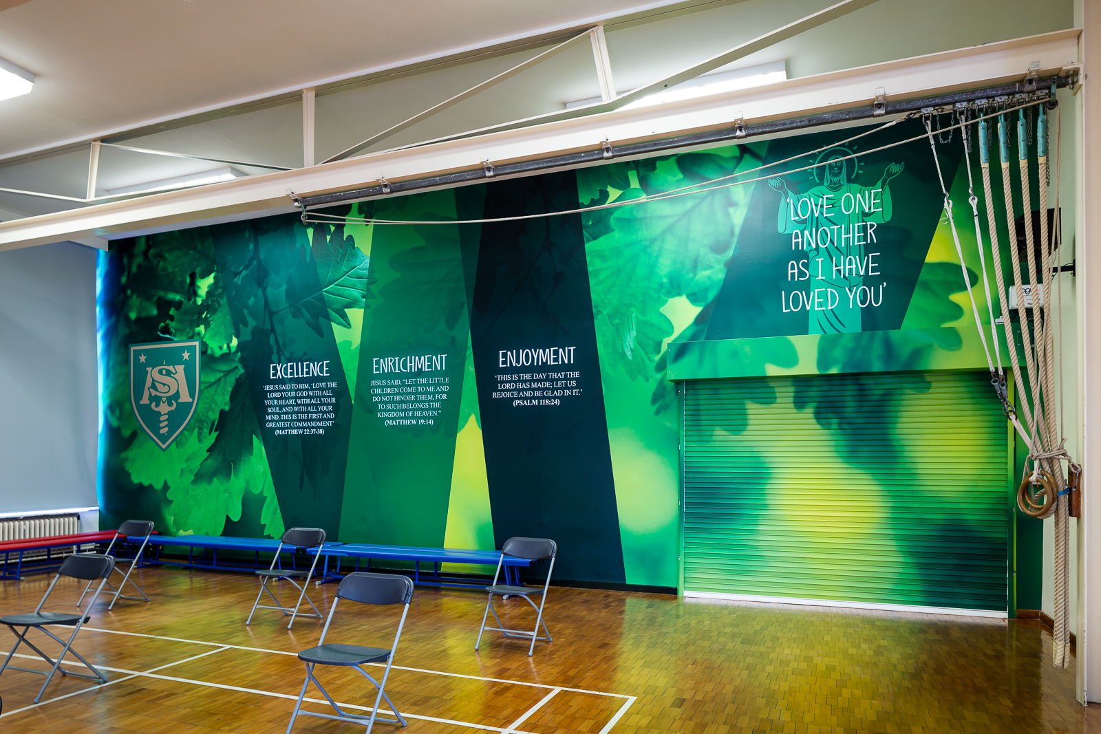 Image of vibrant and bespoke school hall wall art featuring school values